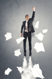 Photo Credit: http://www.123rf.com/photo_21139615_super-hero-businessman-flying-out-the-office.html