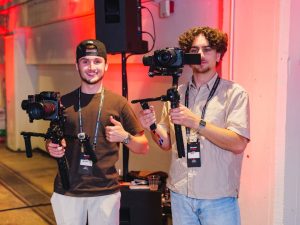 Austin Coburn (left) with Louis of Klicc MultiMedia at an event