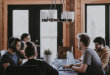Business owners meeting around a table