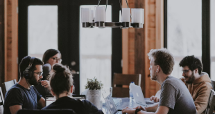 Business owners meeting around a table